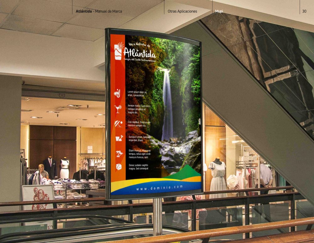 Page 30 of the Atlántida brand manual. In use: a backlit display in a shopping centre.