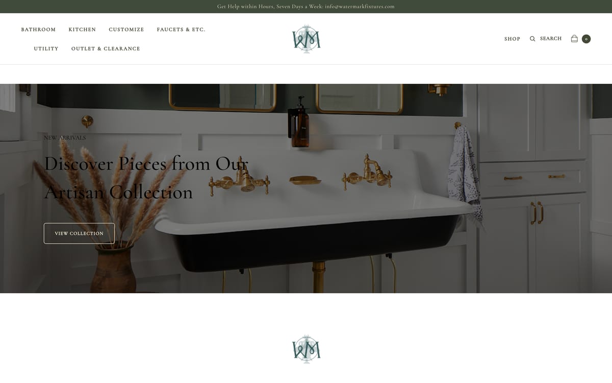 The watermarkfixtures.com home page: the WM monogram centred in the header, the menu (Bathroom, Kitchen, Customize, Faucets & Etc., Utility, Outlet & Clearance) to its left, and the headline “Discover Pieces from Our Artisan Collection” over a trough sink with brass taps.